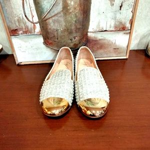 Giuseppe Zanotti sparkling gold flats.